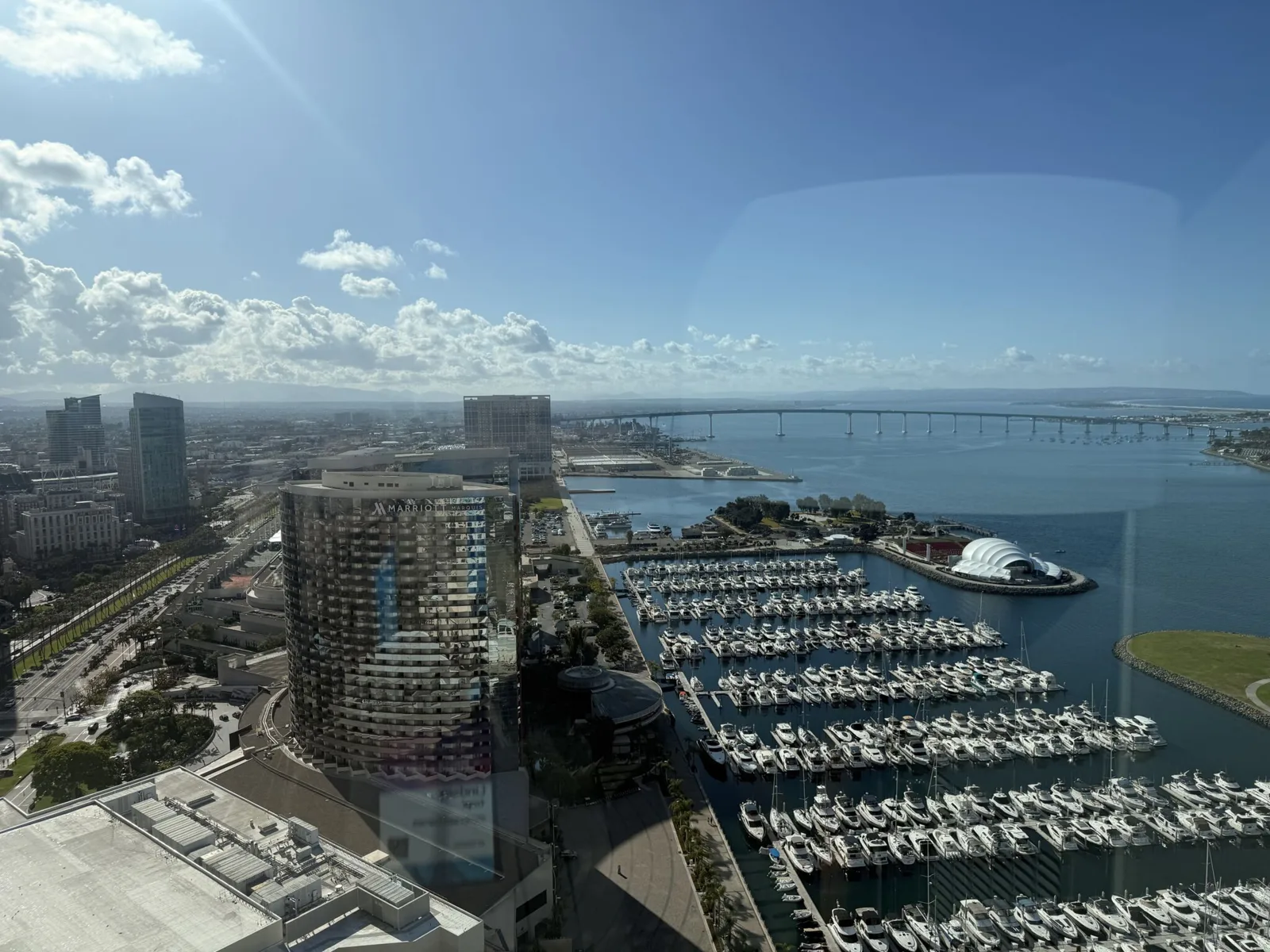 View of the San Diego marina and Coronado bridge from an upper-floor window.